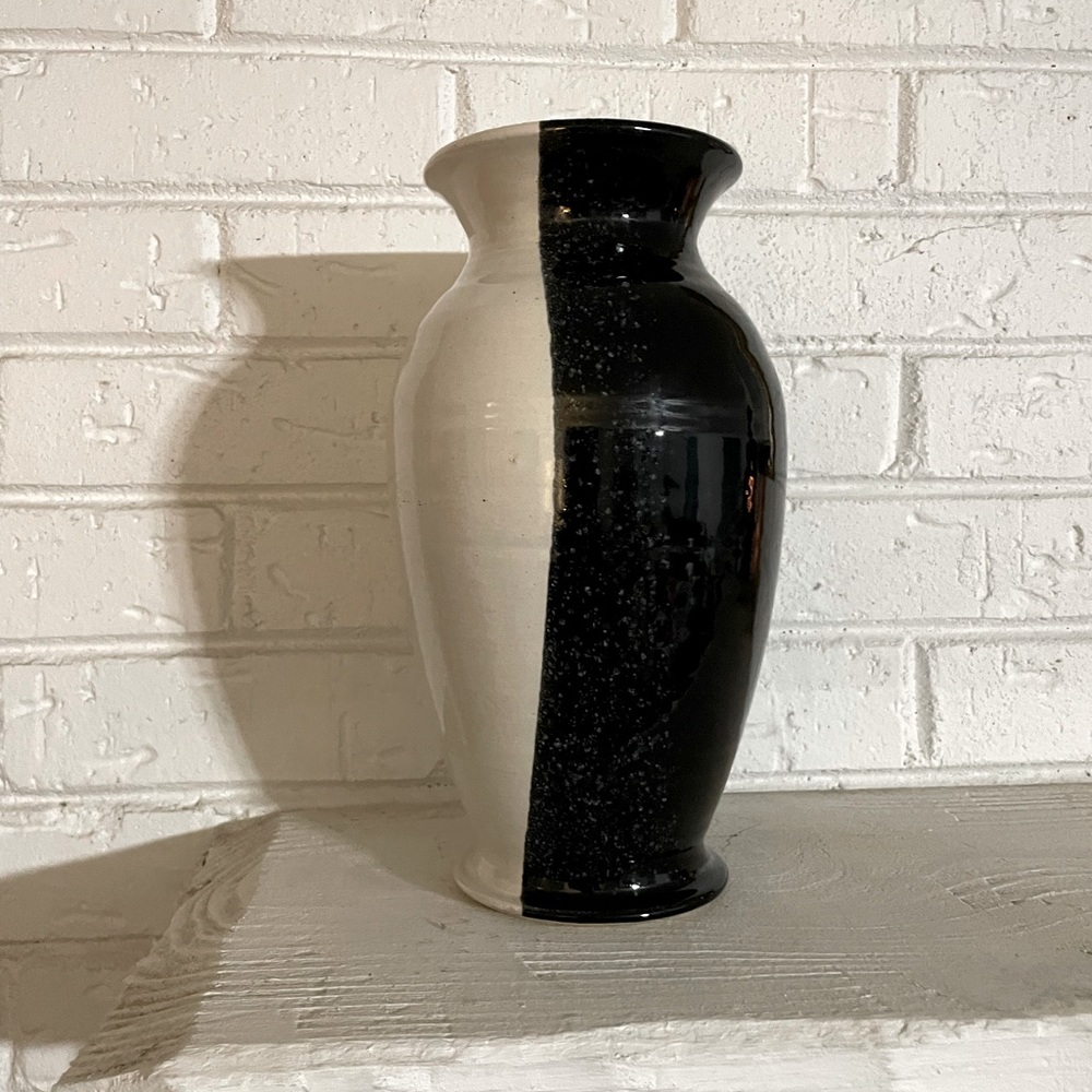 Signed EJ King NC pottery vase. Black and white glossy glaze. 1999. 10” tall.